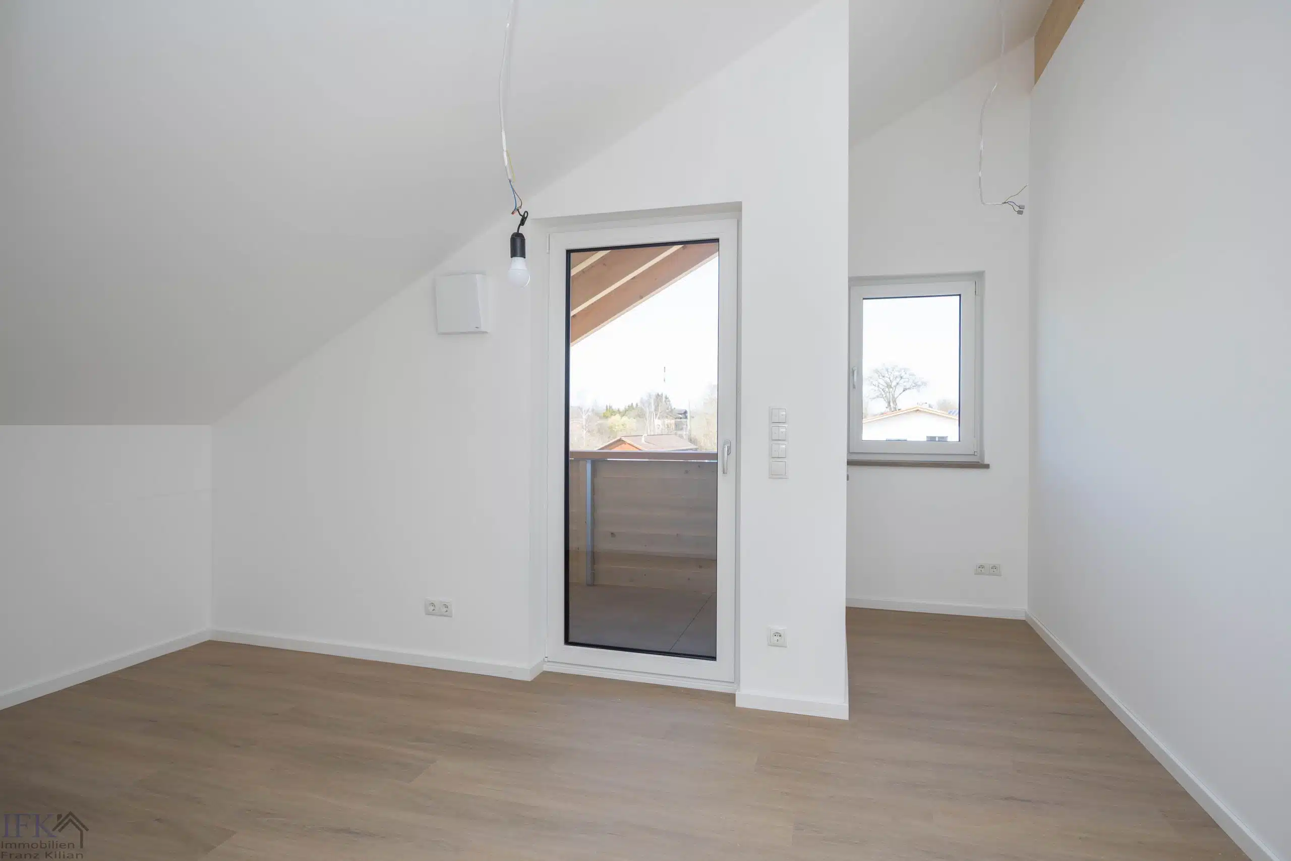 Schlafzimmer 2 - Modern und Energieeffizient. Neubau Dachgeschosswohnung in Bahnhofsnähe in Huglfing!